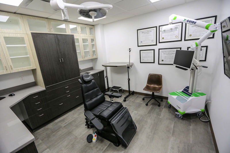 Patient room with Dental chair and imaging machine